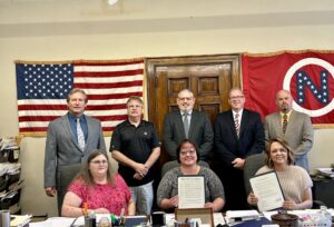 The Noble County Commissioners recently signed two proclamations submitted by GMN Tri-County Community Action Committee. The first proclaimed May 2024 as Older Adult Month In Noble County. The second proclaimed May of 2024 as National Community Action Month. Pictured are (seated): Bonnie Carpenter, Director of Head Start, Samantha Wood of GMN, and Kim Forshey, GMN office manager. (Standing): Commissioner Gary Saling, Gary Ricer, Executive Director of GMN, Commissioner Allen Fraley, Doug Dye, Chief Financial Officer for GMN, and Commissioner Tyler Moore.